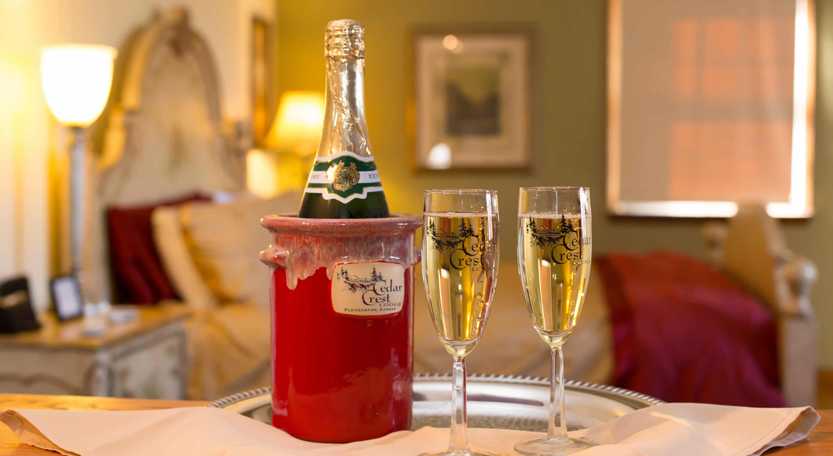 Close up of Champagne in ice bucket and two glasses