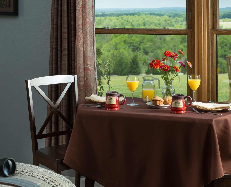 Country Meadow Room dining area with breakfast on the table at Kansas resort