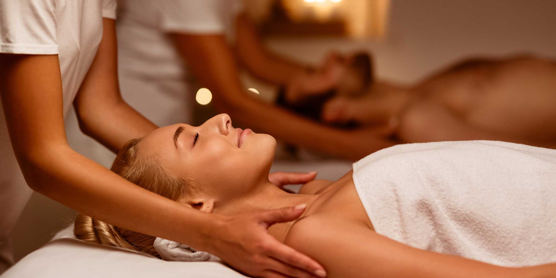 Man and woman getting a relaxing couples massage