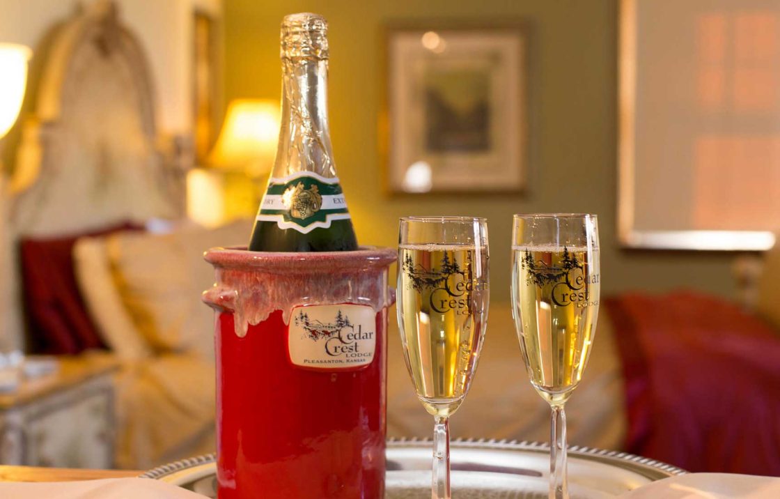 Close up of Champagne in ice bucket and two glasses