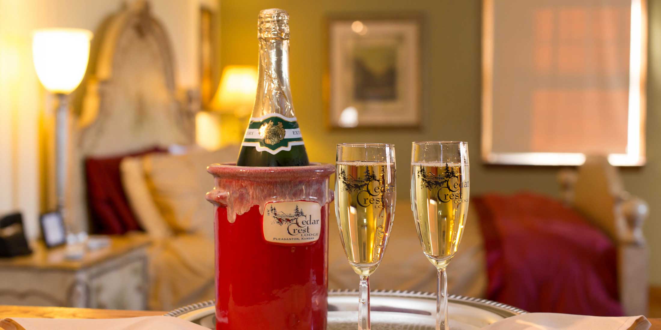 Close up of Champagne in ice bucket and two glasses