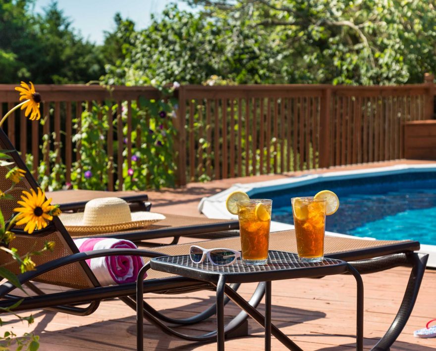 Pool lounge chairs and table