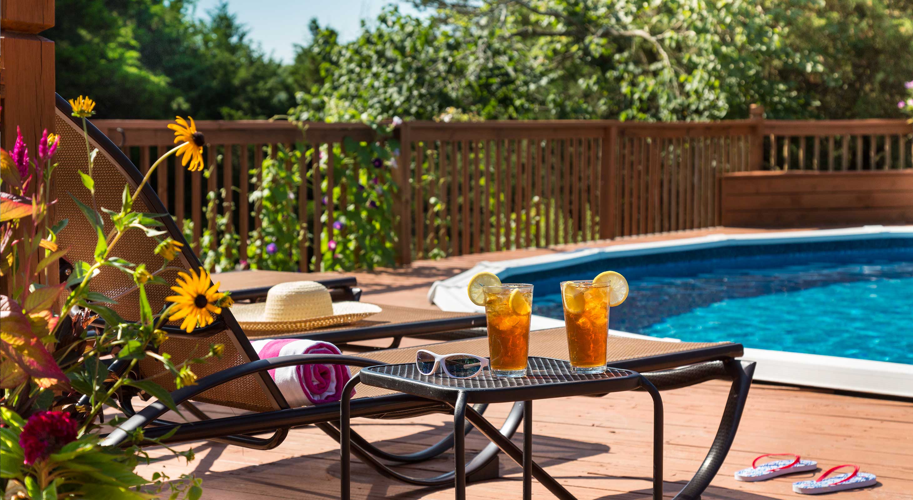 Pool lounge chairs and table