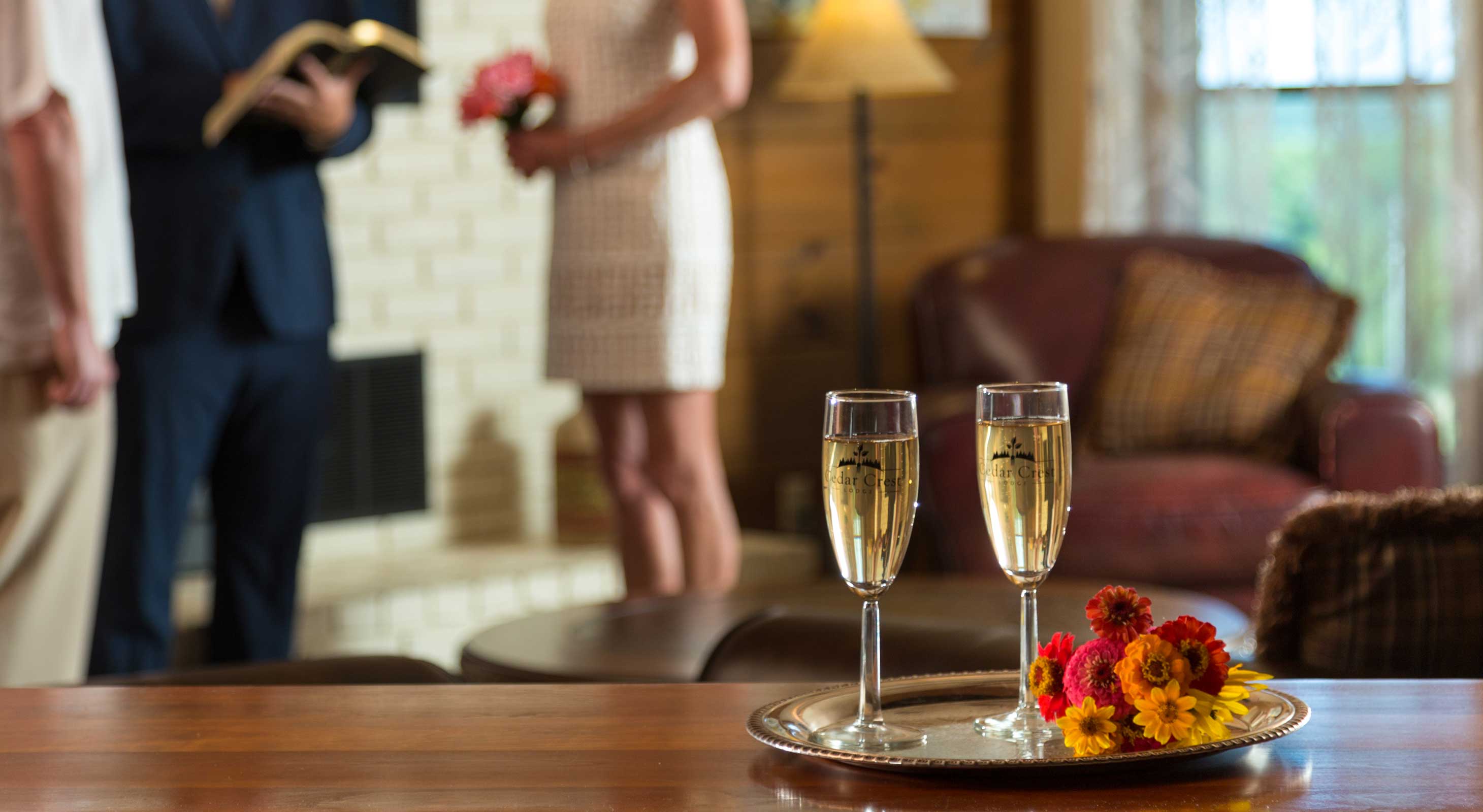 Elopement and Champagne toast in by the fireplace during a Kansas wedding