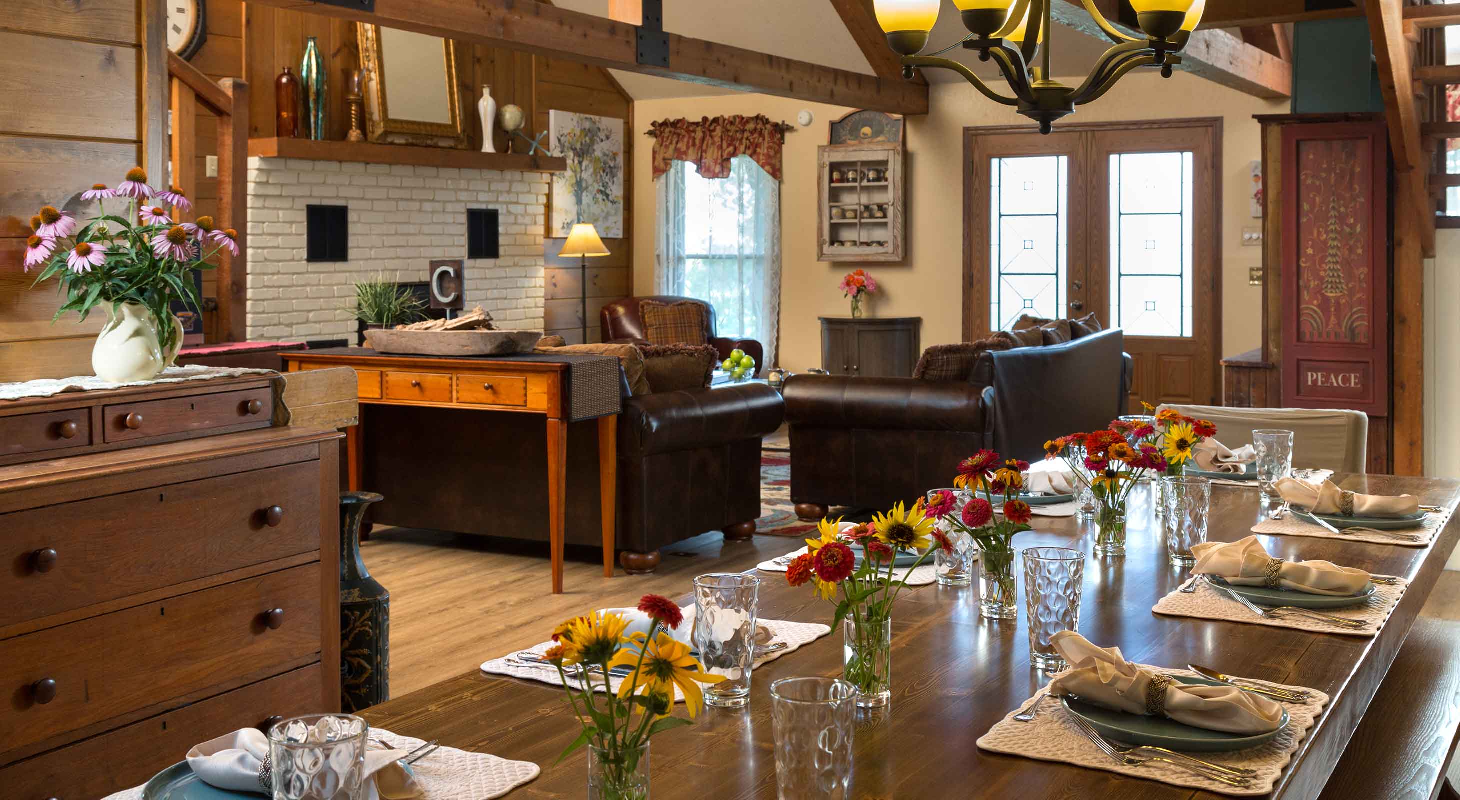 Living room and dining table set up for a retreat in Kansas