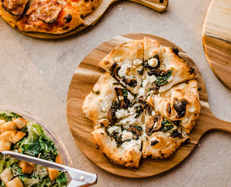 Salad and pizzas right from the pizza oven