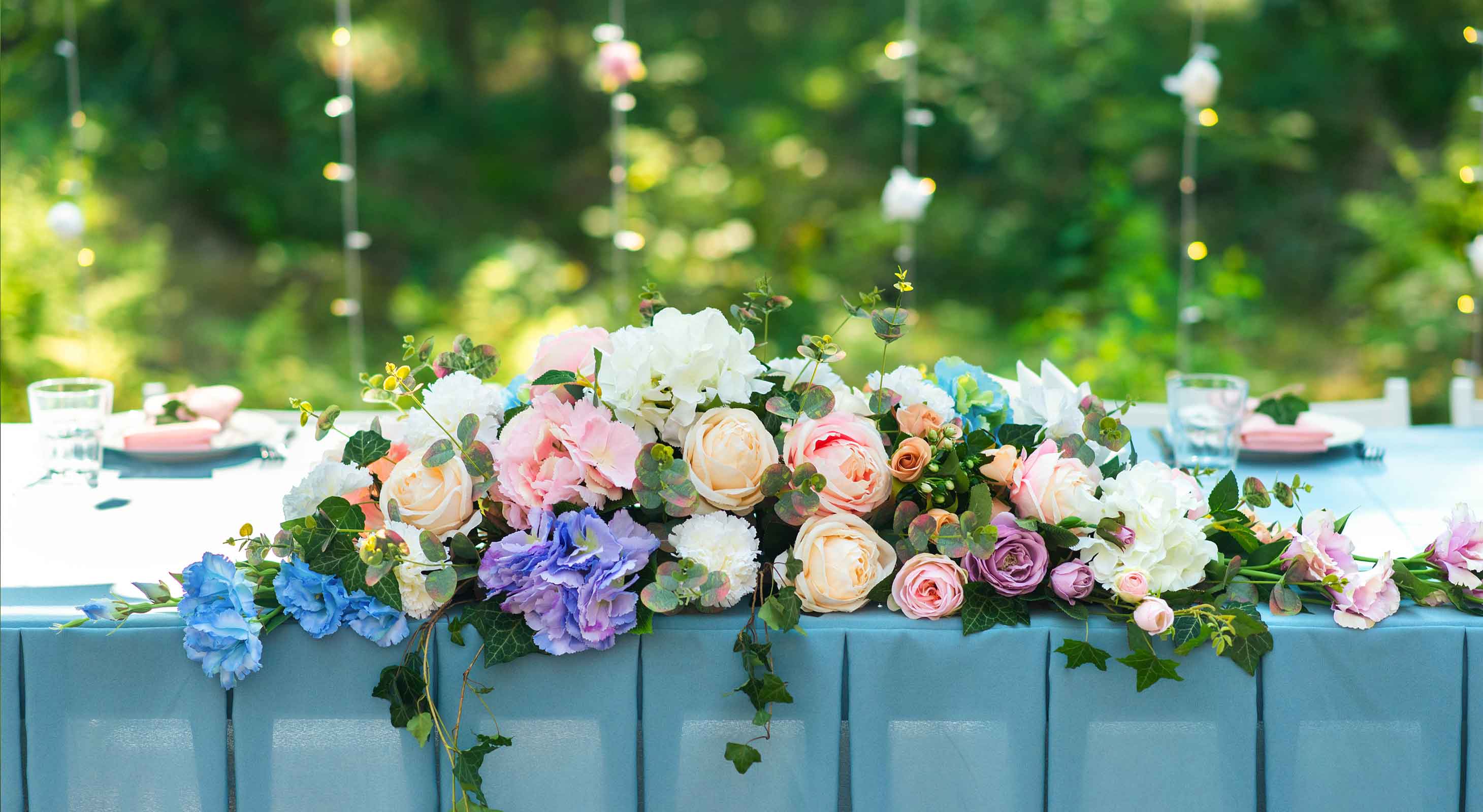 Wedding table décor on a blue tablecloth