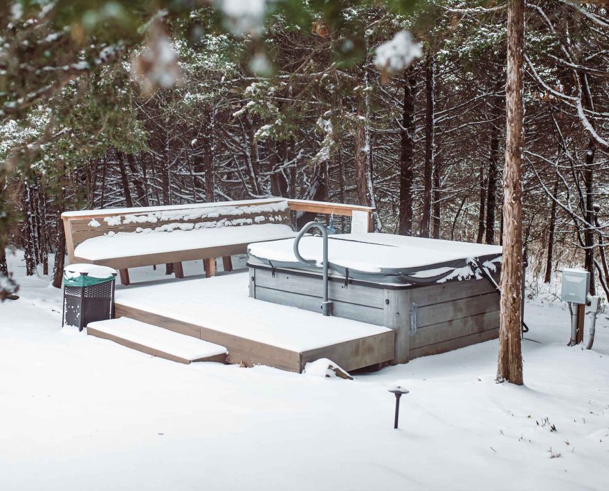 Hot tub covered with snow in the winter