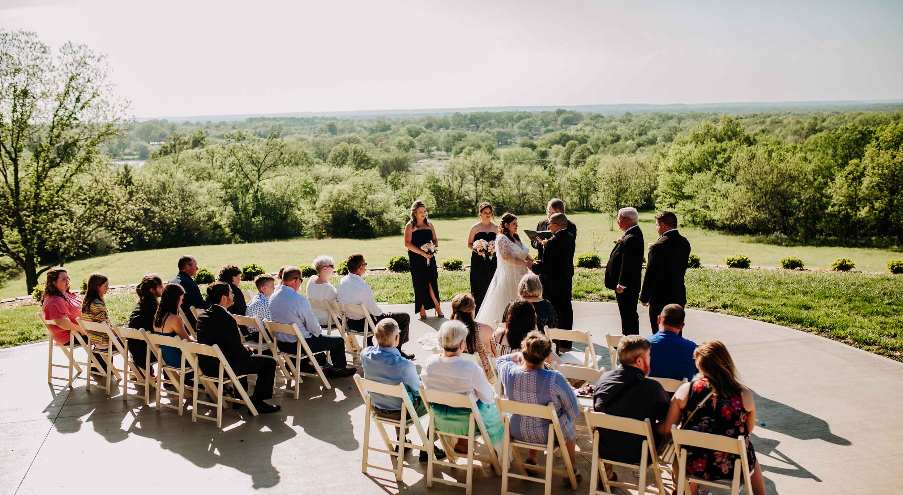 Wedding ceremony on the patio at Kansas wedding venue