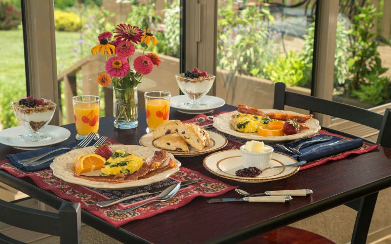 a breakfast spread with pastries and other options