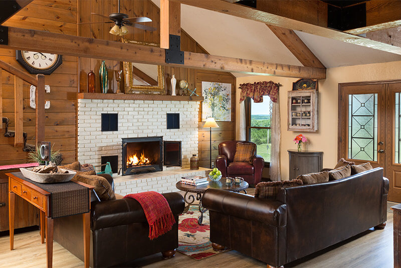 Sit fireside and relax in the Common Room of Cedar Crest Lodge.