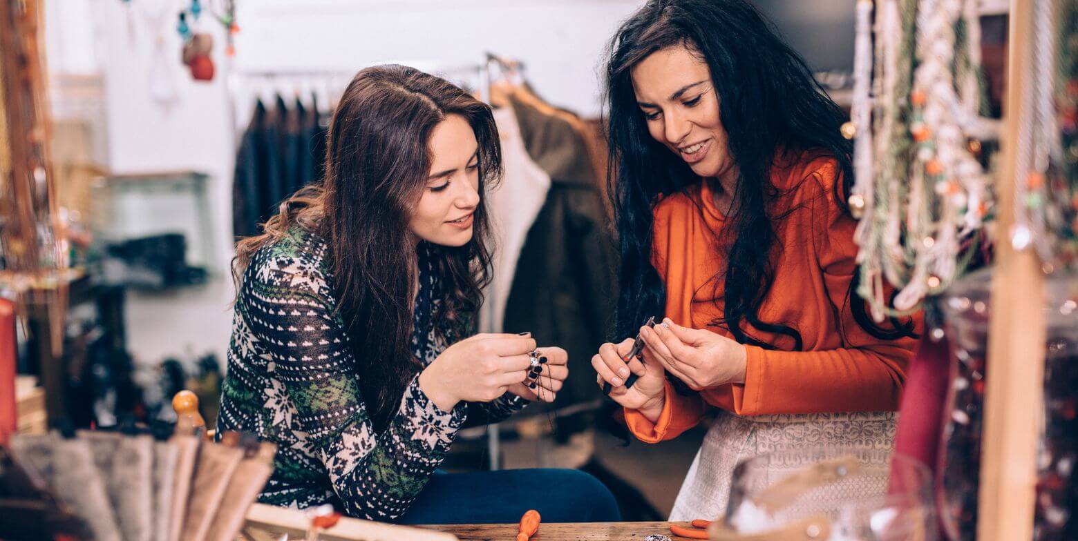 women creating jewelry together